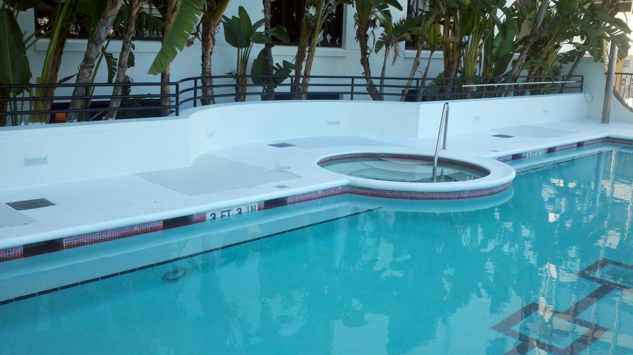 Freshly coated pool deck and spa surround