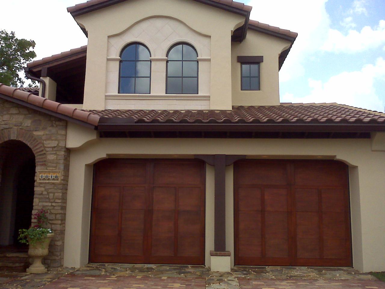Pair of garage doors with a rich stained finish